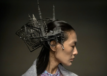 Showcased at China Fashion Week, this metal headpiece depicts several world landmarks